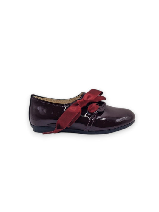 Sapato com laço lateral