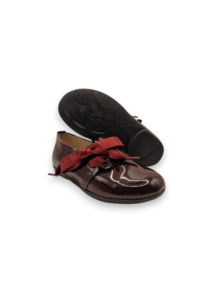 Sapato com laço lateral